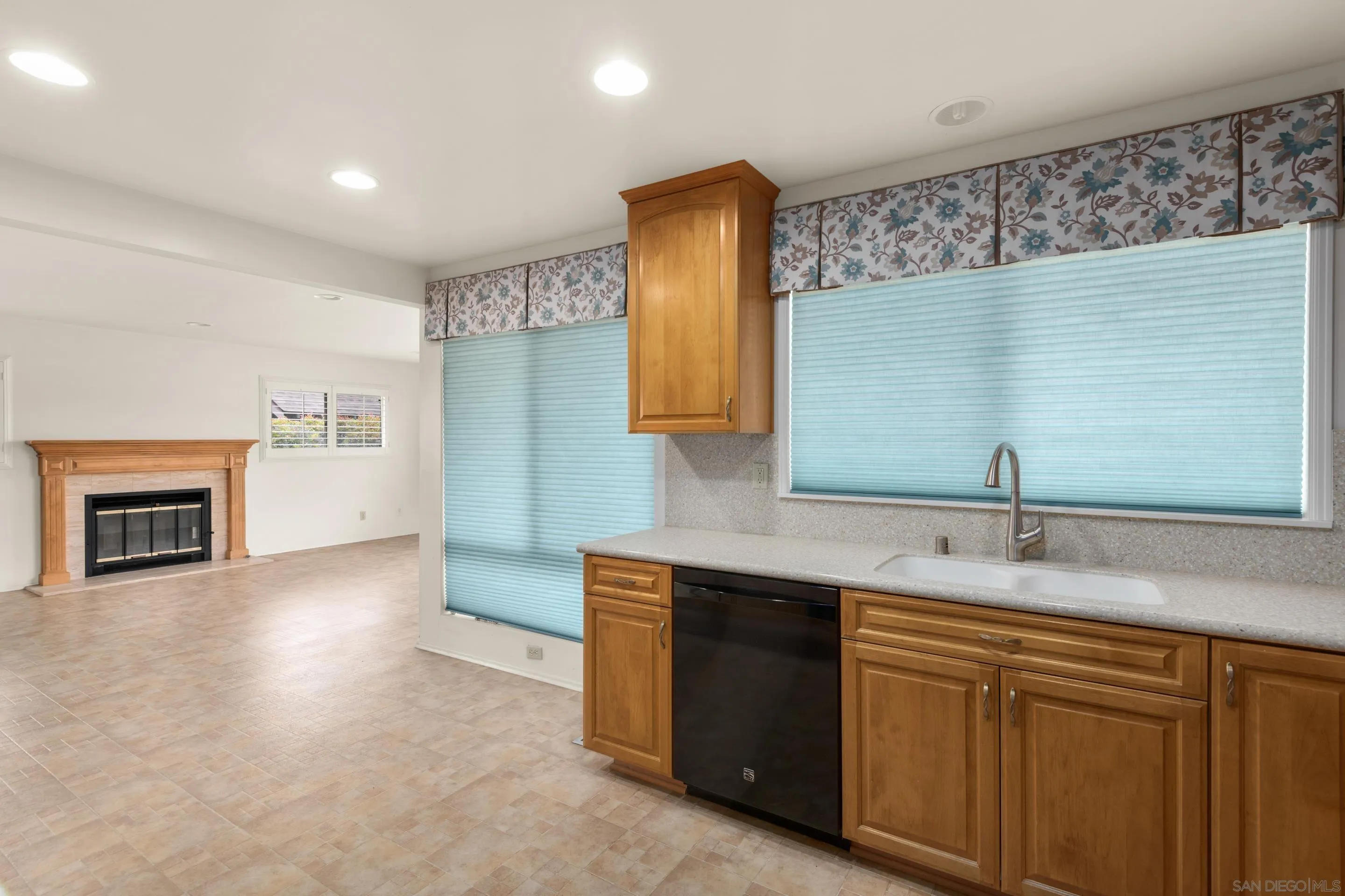 486 Murray Drive El Cajon, CA 92020 - Photo 9 of 23 a kitchen with a sink and a refrigerator