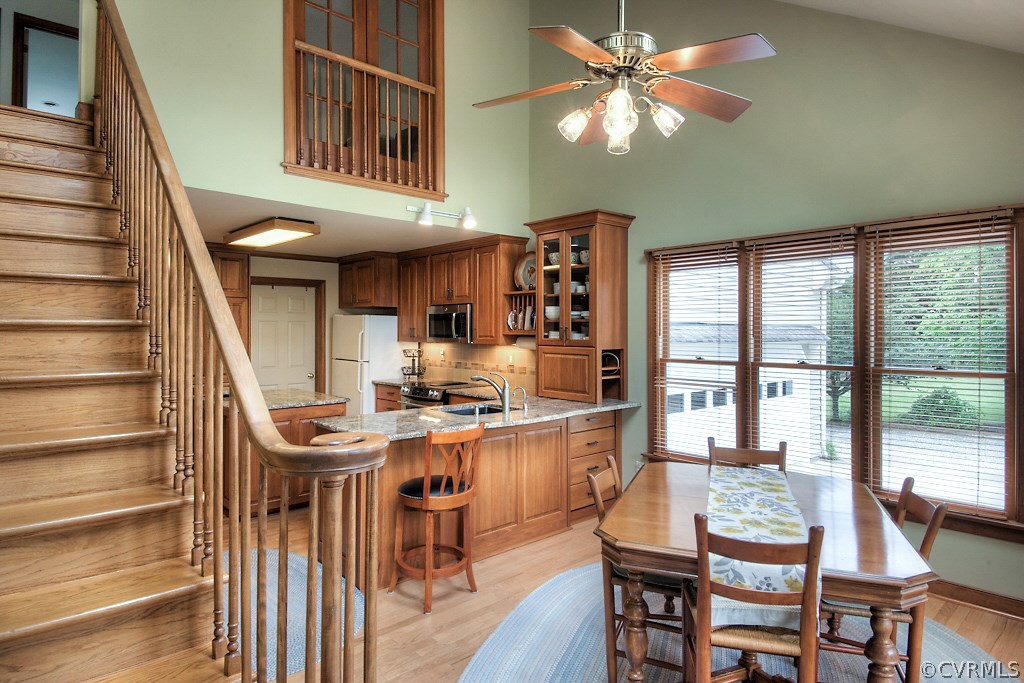 5502 Manitoba Road Chesterfield, VA 23832 - Photo 8 of 48 a dining room with furniture and a floor to ceiling window