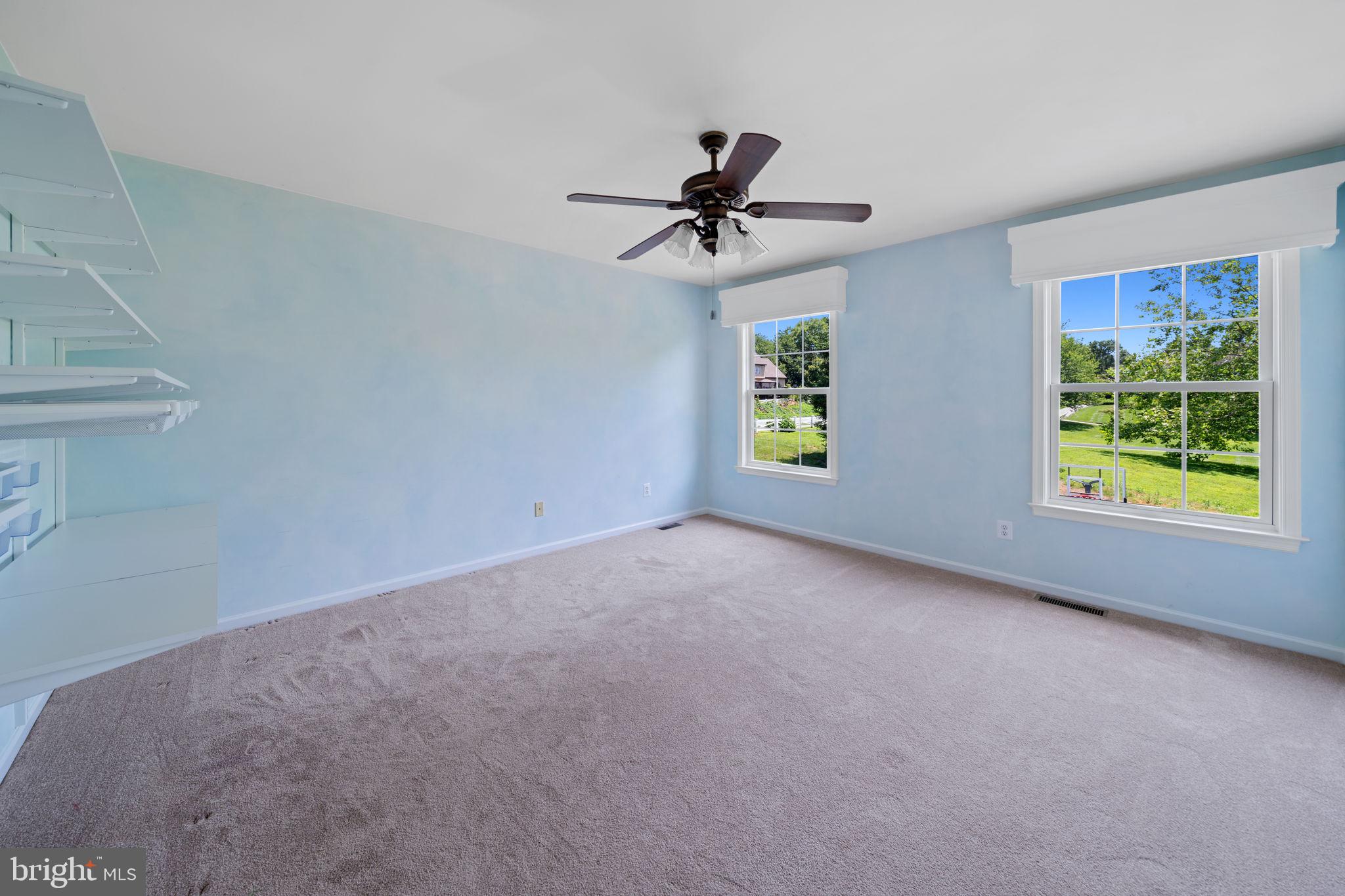 224 Laurel Heights Road Landenberg, PA 19350 - Photo 35 of 95 a view of a livingroom with a window and a ceiling fan