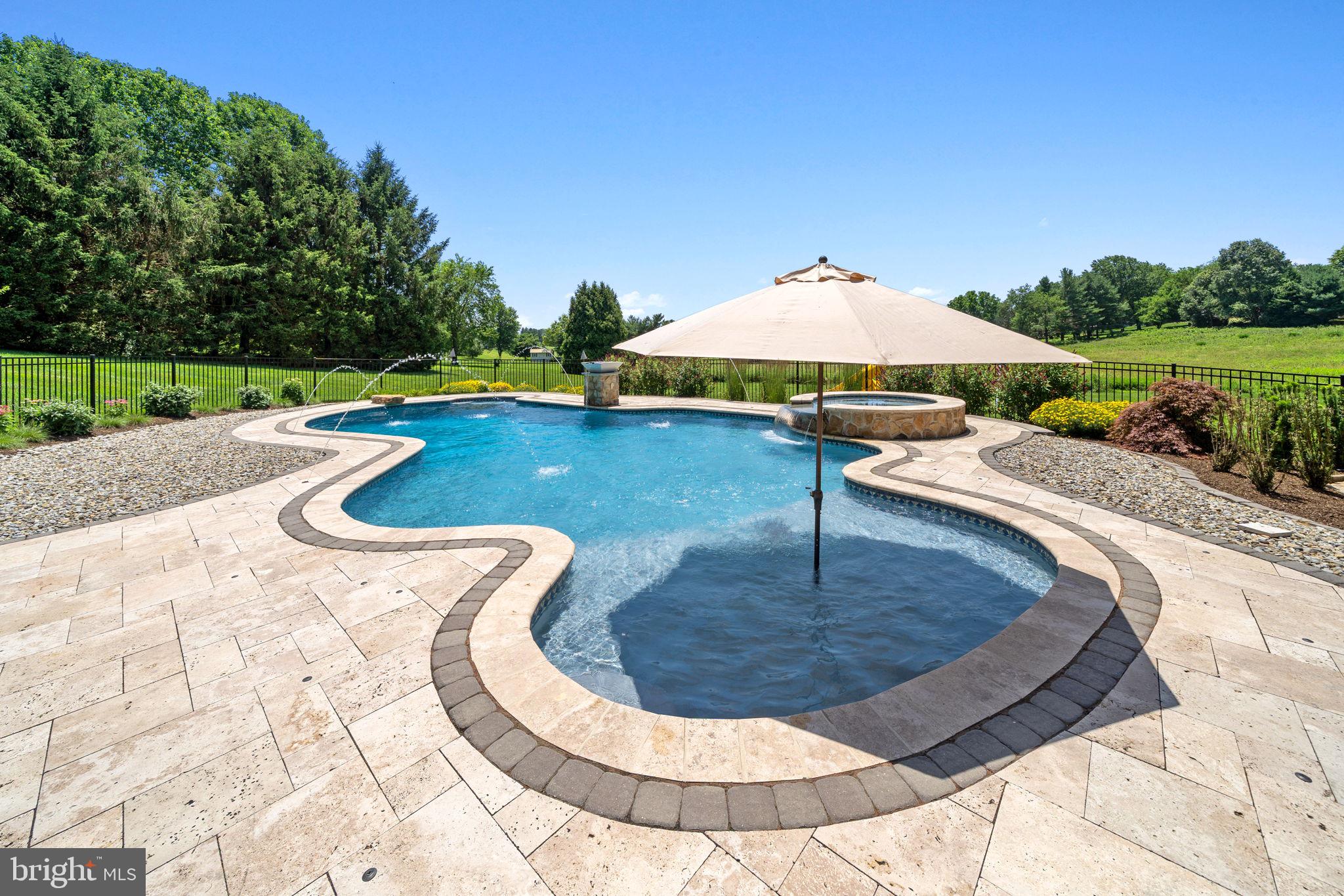224 Laurel Heights Road Landenberg, PA 19350 - Photo 59 of 95 a view of a swimming pool with a patio