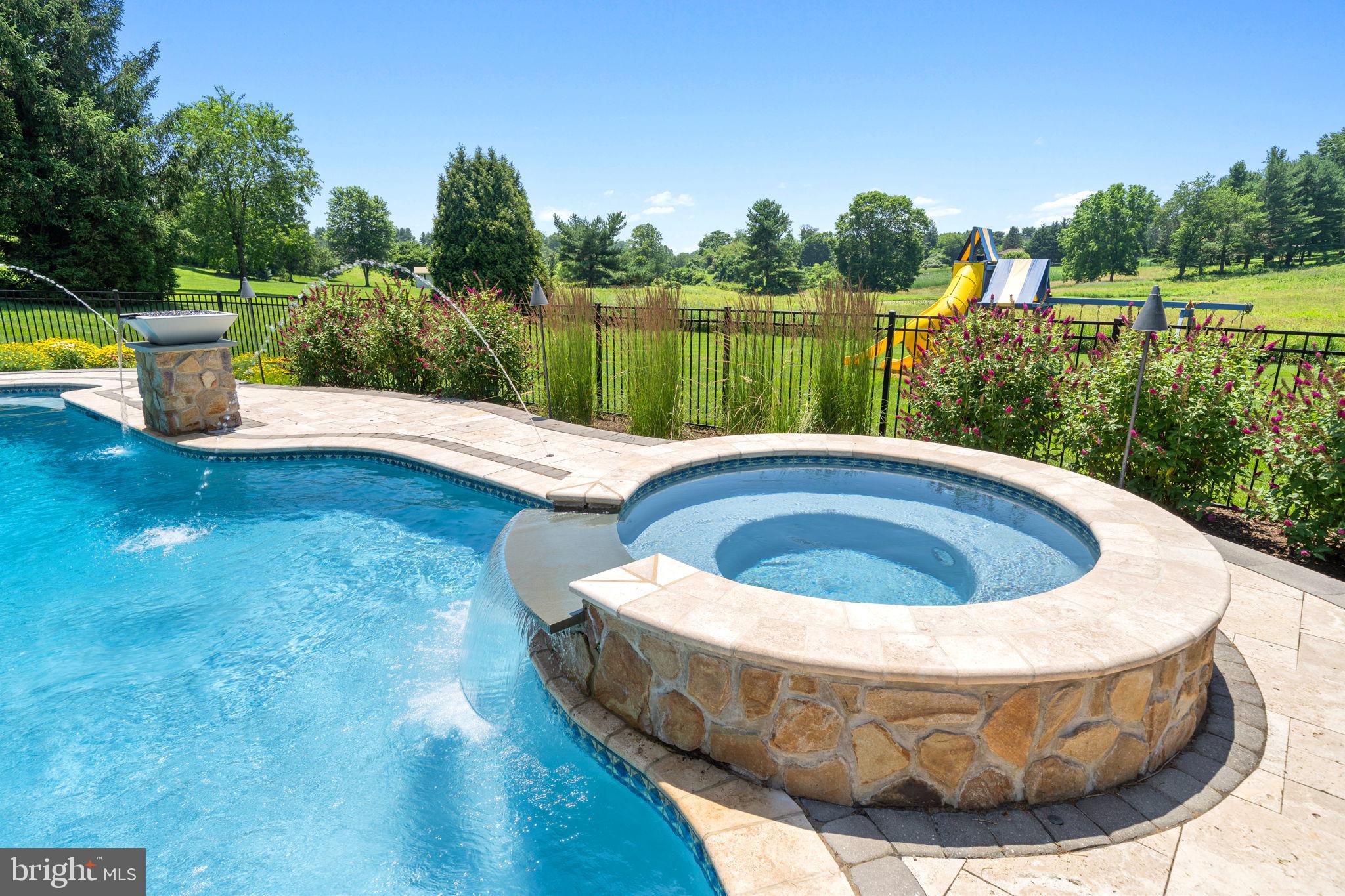 224 Laurel Heights Road Landenberg, PA 19350 - Photo 64 of 95 a view of a swimming pool with a back yard