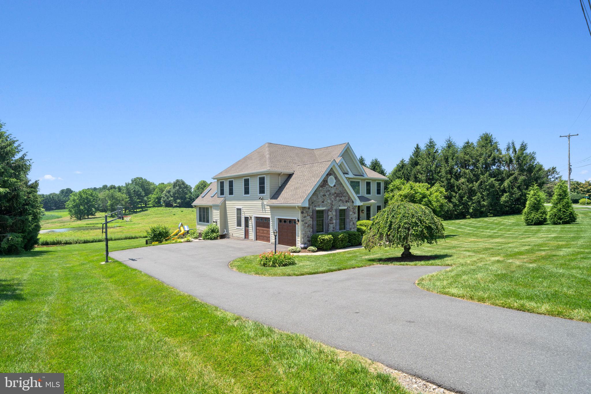 224 Laurel Heights Road Landenberg, PA 19350 - Photo 72 of 95 a front view of a house with a yard