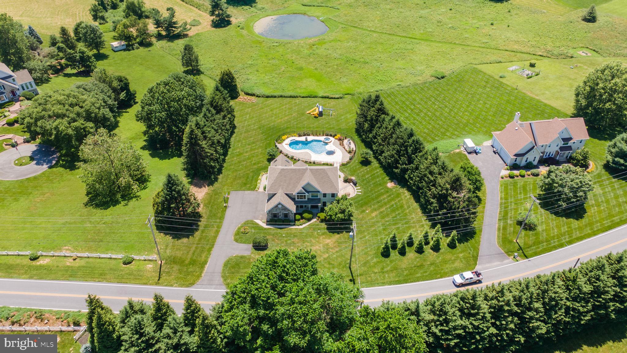 224 Laurel Heights Road Landenberg, PA 19350 - Photo 81 of 95 an aerial view of a house with a garden