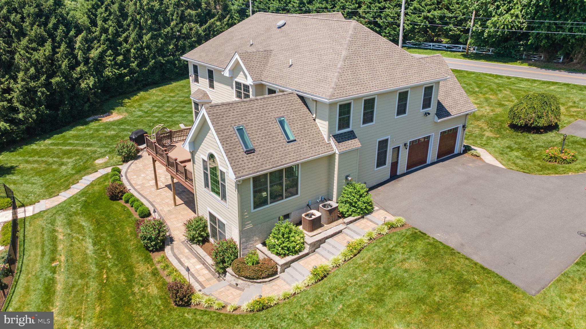224 Laurel Heights Road Landenberg, PA 19350 - Photo 84 of 95 an aerial view of a house with a yard and potted plants