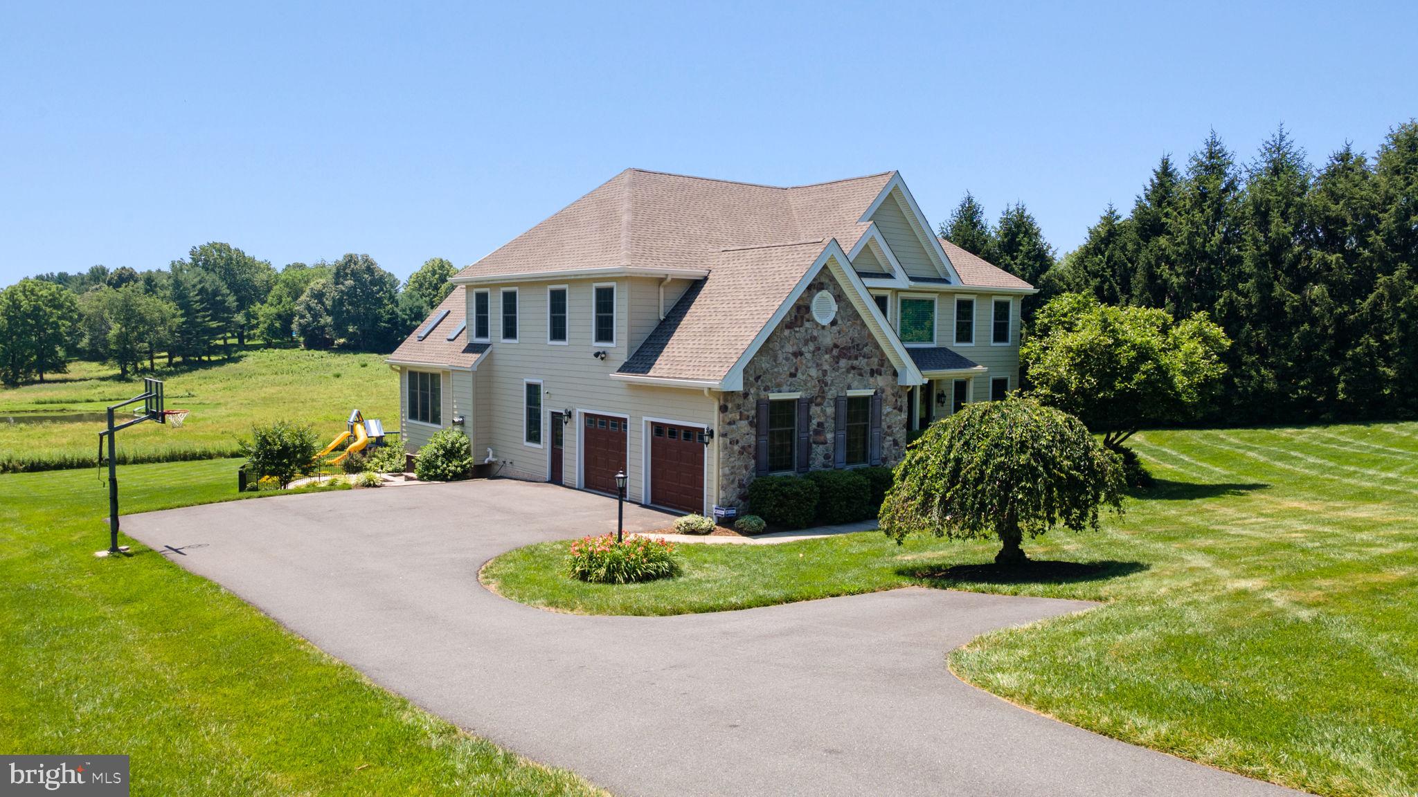 224 Laurel Heights Road Landenberg, PA 19350 - Photo 86 of 95 a front view of a house with a yard