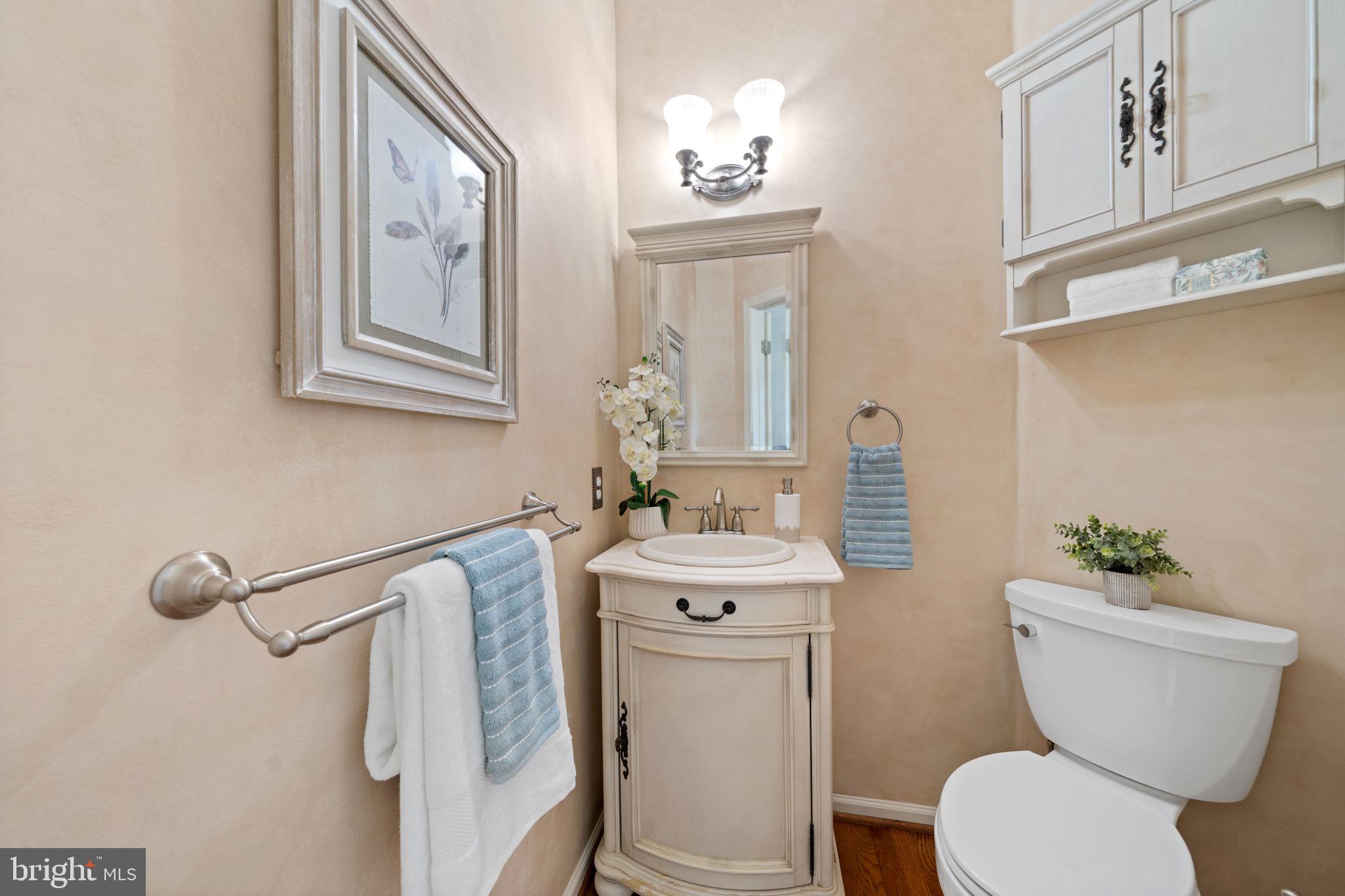 224 Laurel Heights Road Landenberg, PA 19350 - Photo 10 of 95 a bathroom with a toilet a sink and a mirror