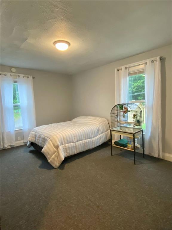 234 Marwood Road Cabot, PA 16023 - Photo 19 of 22 a bedroom with a bed and a window
