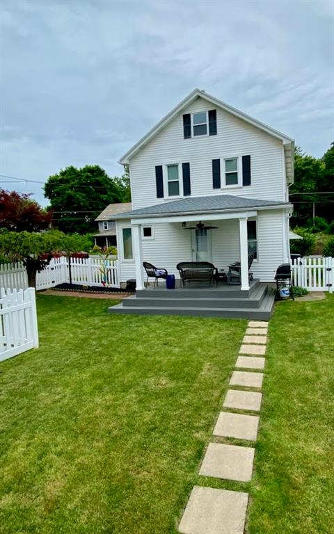 234 Marwood Road Cabot, PA 16023 - Photo 2 of 22 a front view of a house with a garden and lake view