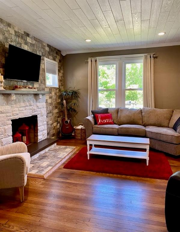 234 Marwood Road Cabot, PA 16023 - Photo 8 of 22 a living room with furniture flat screen tv and a fireplace