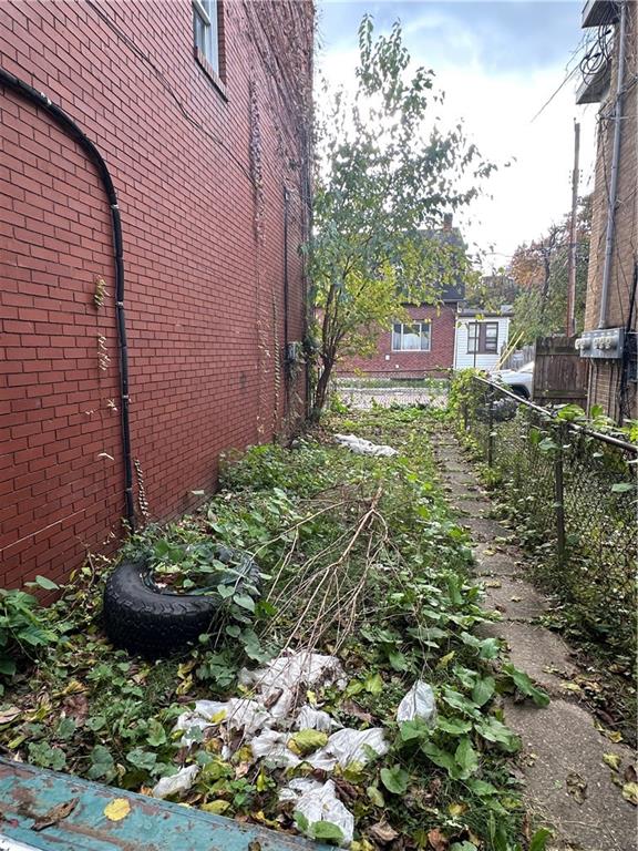 200 Copeland Street McKees Rocks, PA 15136 - Photo 13 of 39 a view of a pathway with a flower garden