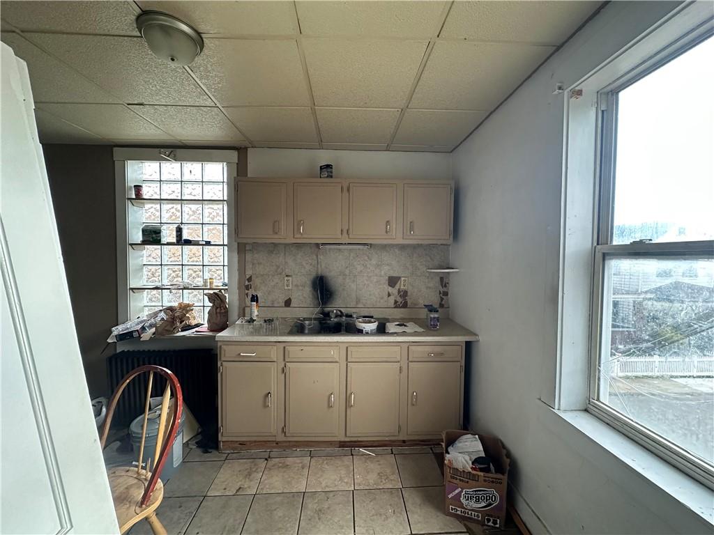 200 Copeland Street McKees Rocks, PA 15136 - Photo 22 of 39 a utility room with a sink a washer and dryer