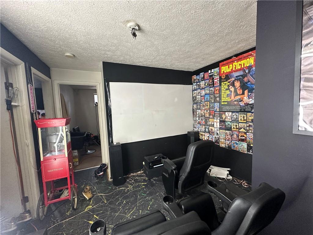 200 Copeland Street McKees Rocks, PA 15136 - Photo 25 of 39 a work room with furniture and a flat screen tv