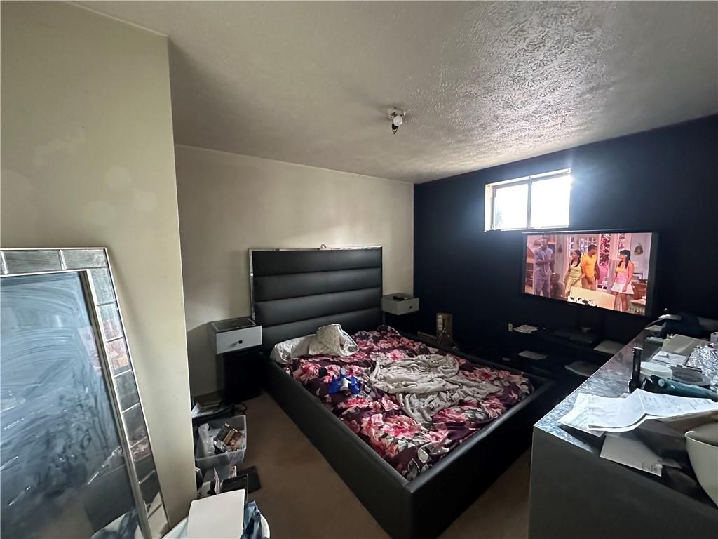 200 Copeland Street McKees Rocks, PA 15136 - Photo 28 of 39 a living room with furniture and a flat screen tv