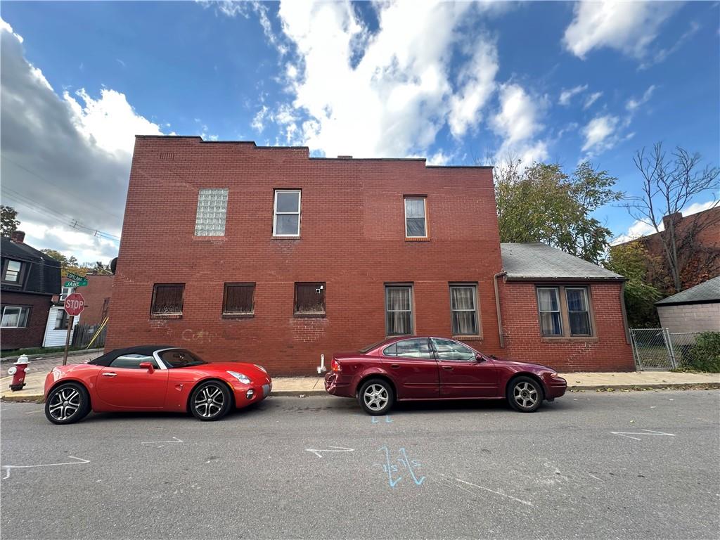 200 Copeland Street McKees Rocks, PA 15136 - Photo 5 of 39 a car parked in front of a house