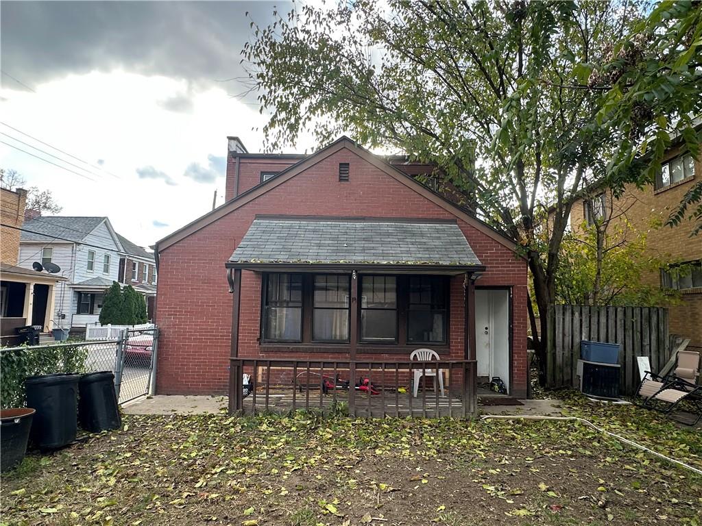 200 Copeland Street McKees Rocks, PA 15136 - Photo 6 of 39 a front view of a house with garden
