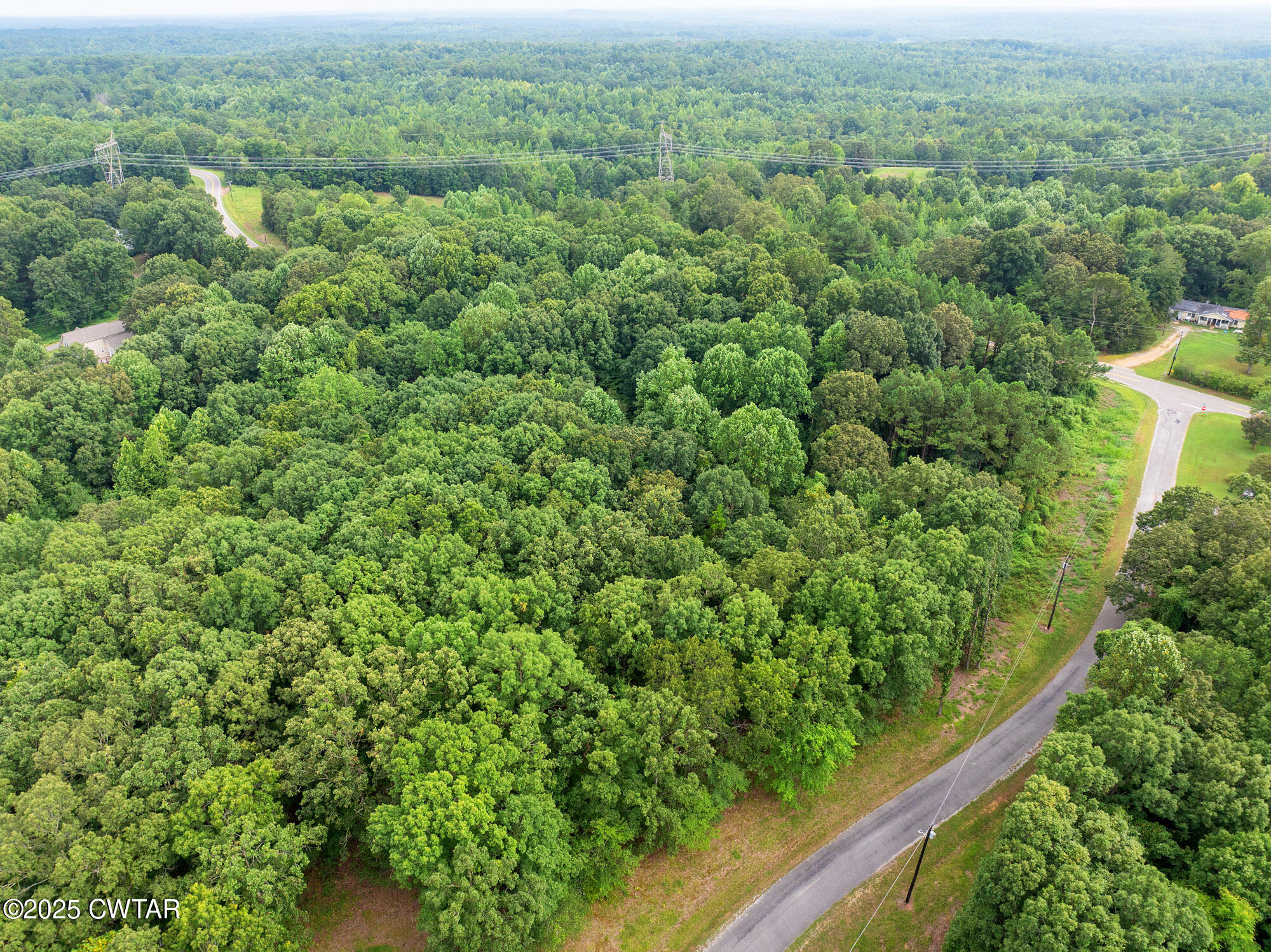 Lot 30 Stan Lane Cedar Grove, TN 38321 - Photo 4 of 11 an aerial view of residential house with outdoor space and trees all around
