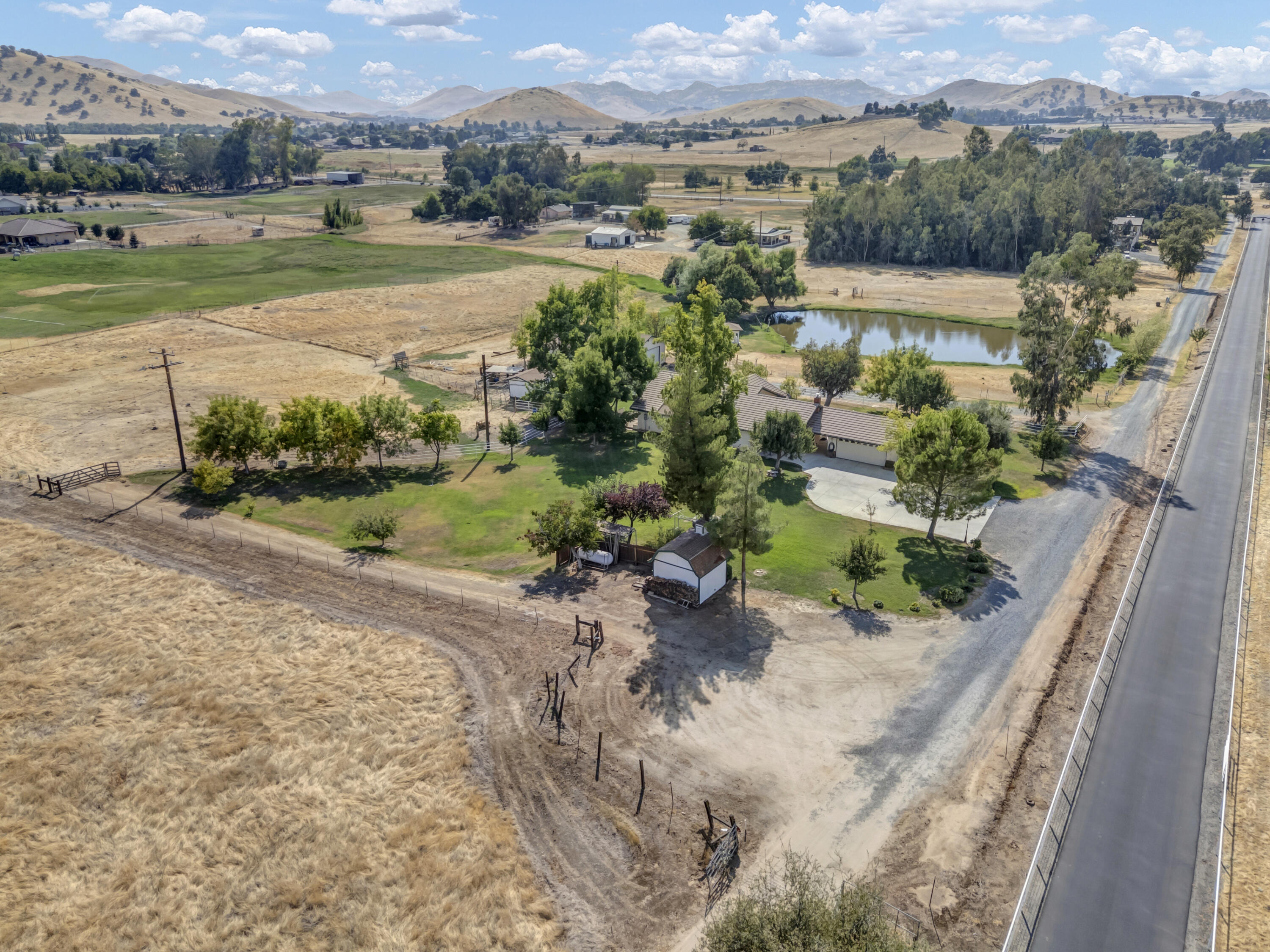 18002 320th Road Springville, CA 93265 - Photo 50 of 56 an aerial view of a houses with outdoor space and garden