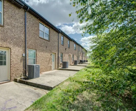 a view of a back yard of the house