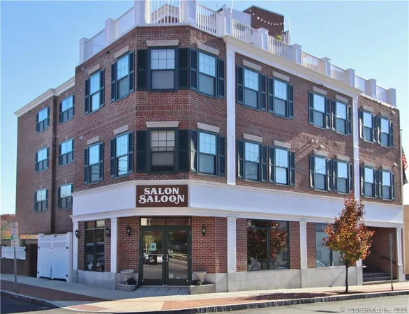 a front view of multi story residential apartment building
