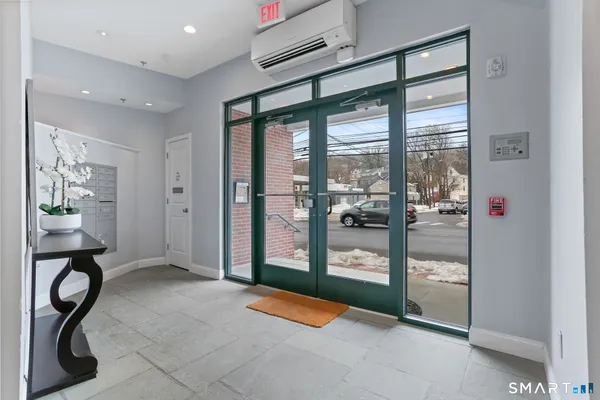 a view of entryway with livingroom