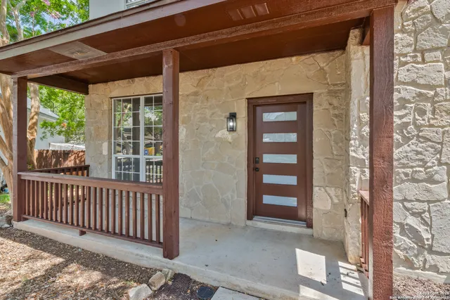 a view of a porch of a house