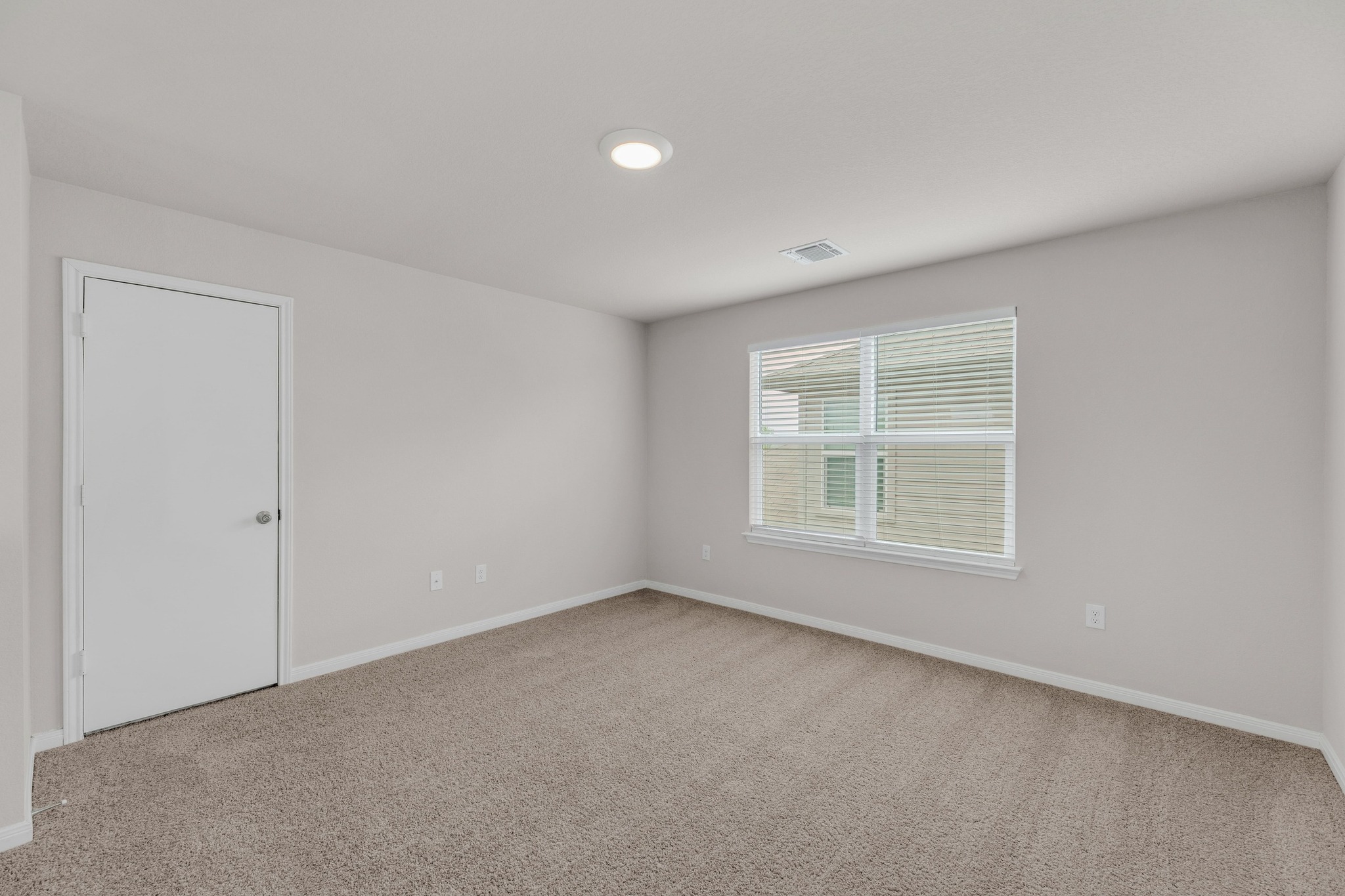 2900 Tweedy Trail Pflugerville, TX 78660 - Photo 17 of 33 Carpeted spare room featuring baseboards