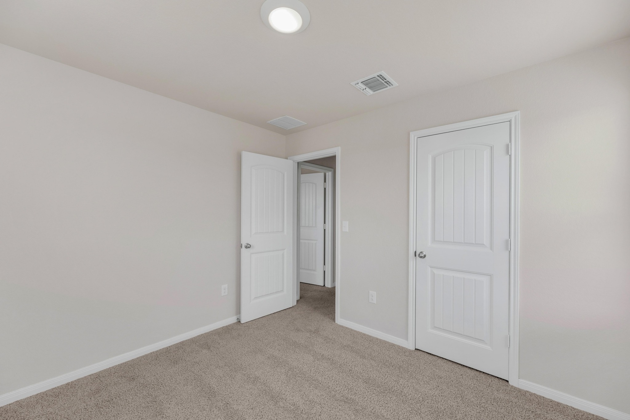 2900 Tweedy Trail Pflugerville, TX 78660 - Photo 19 of 33 Unfurnished bedroom featuring light colored carpet and baseboards