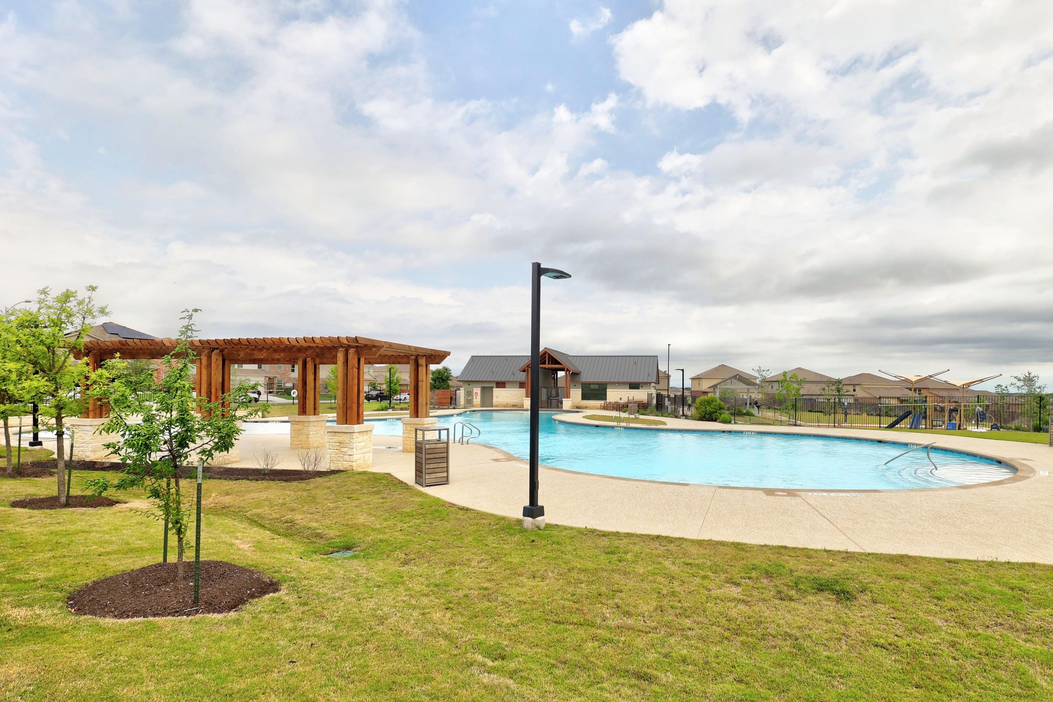 2900 Tweedy Trail Pflugerville, TX 78660 - Photo 27 of 33 Community pool with a pergola and a patio