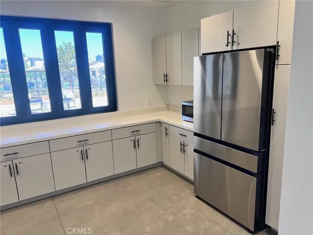 a view of a glass door and an empty room