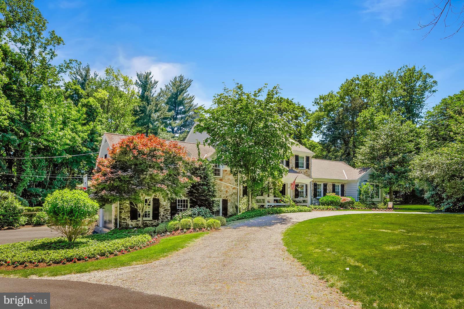 1700 Old Welsh Road Huntingdon Valley, PA 19006 - Photo 2 of 105 a front view of a house with a yard