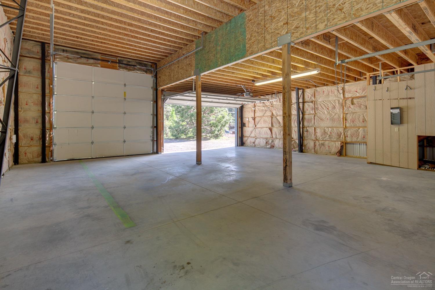 19325 Baker Road Bend, OR 97702 - Photo 18 of 25 Metal shop, view from back corner of RV