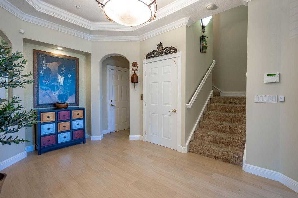 2825 Marina Circle, Unit 2825 Lighthouse Point, FL 33064 - Photo 16 of 48 a view of a hallway with wooden floor and entryway