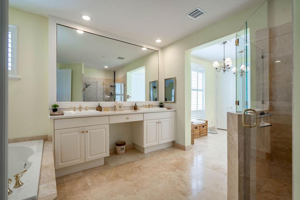2825 Marina Circle, Unit 2825 Lighthouse Point, FL 33064 - Photo 34 of 48 a bathroom with a double vanity sink mirror and shower