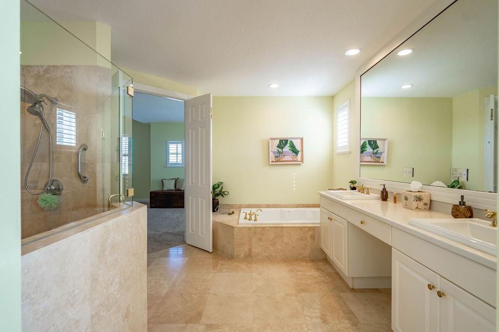 2825 Marina Circle, Unit 2825 Lighthouse Point, FL 33064 - Photo 35 of 48 a large spacious bathroom with a large tub shower and sink
