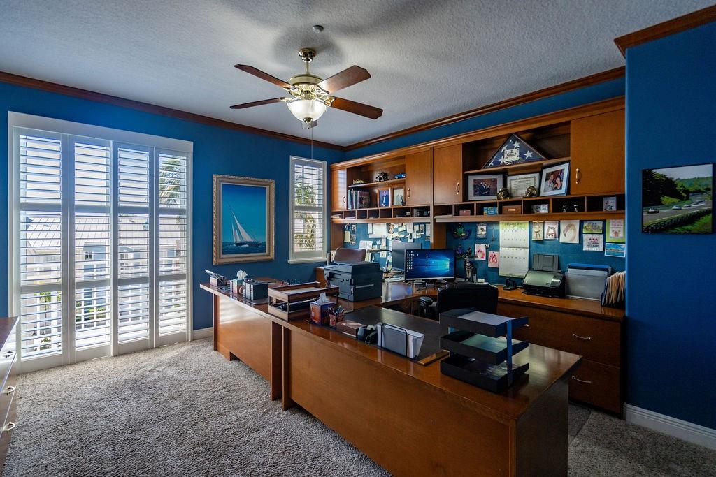 2825 Marina Circle, Unit 2825 Lighthouse Point, FL 33064 - Photo 39 of 48 a living room with furniture and a chandelier