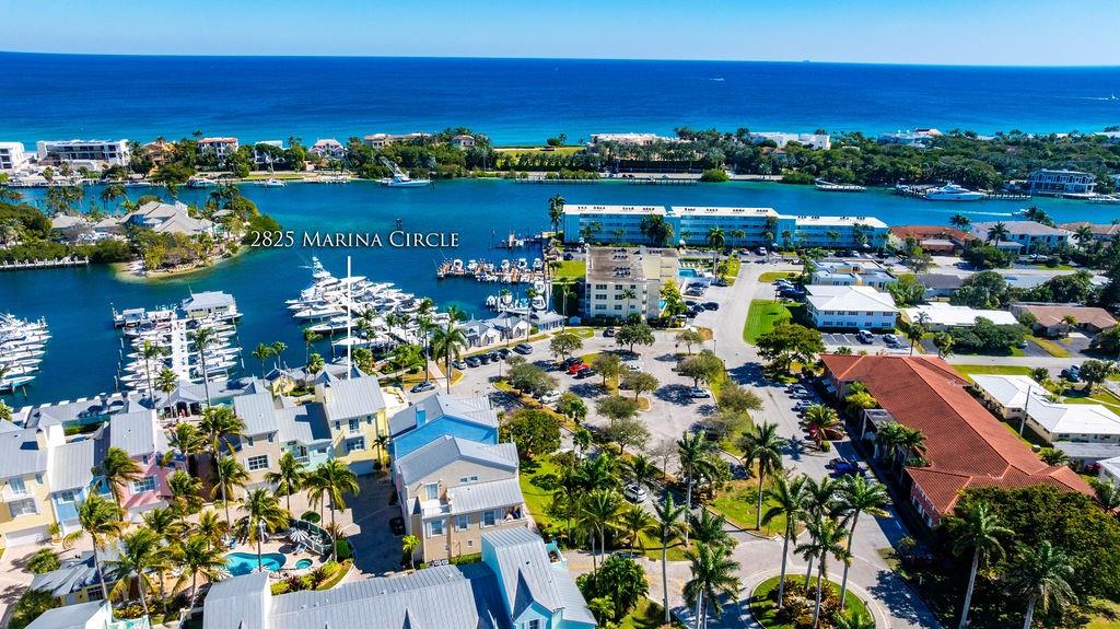 2825 Marina Circle, Unit 2825 Lighthouse Point, FL 33064 - Photo 5 of 48 a view of a lake with a city view