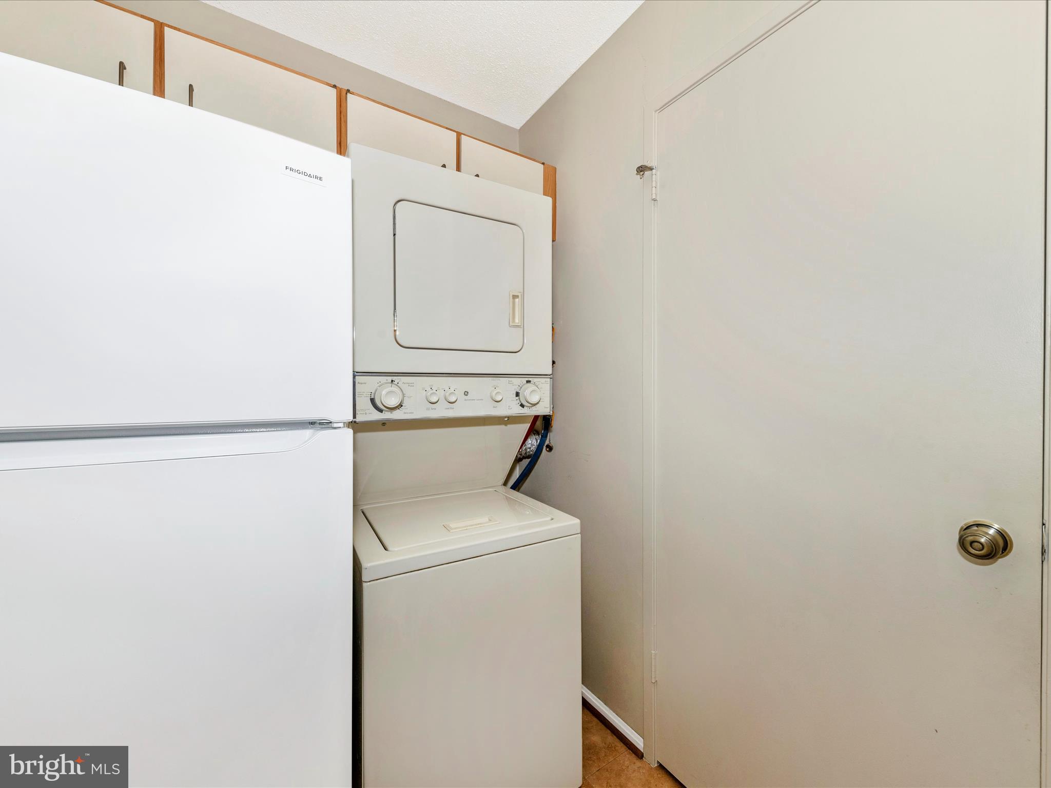 15101 Interlachen Drive, Unit 1116 Silver Spring, MD 20906 - Photo 20 of 78 a utility room with dryer and washer