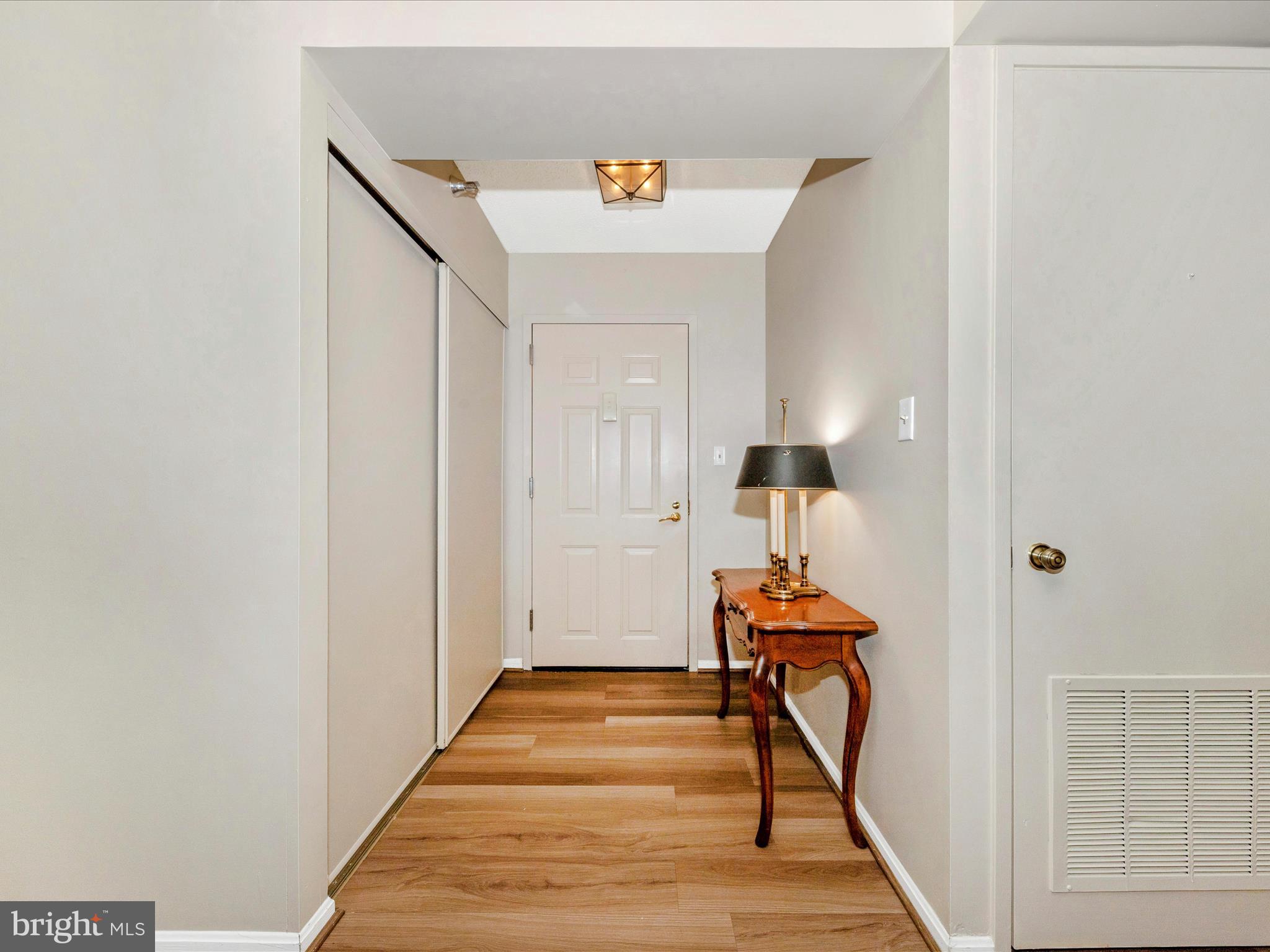 15101 Interlachen Drive, Unit 1116 Silver Spring, MD 20906 - Photo 3 of 78 a view of a hallway with seating area