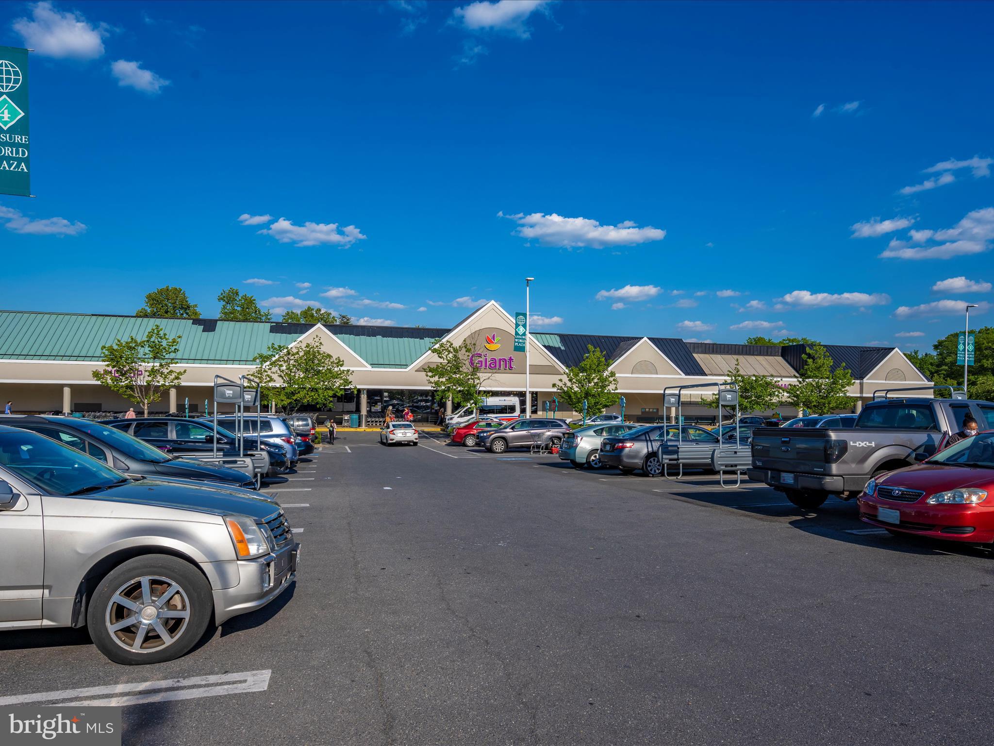 15101 Interlachen Drive, Unit 1116 Silver Spring, MD 20906 - Photo 40 of 78 a view of a car park in front of a house