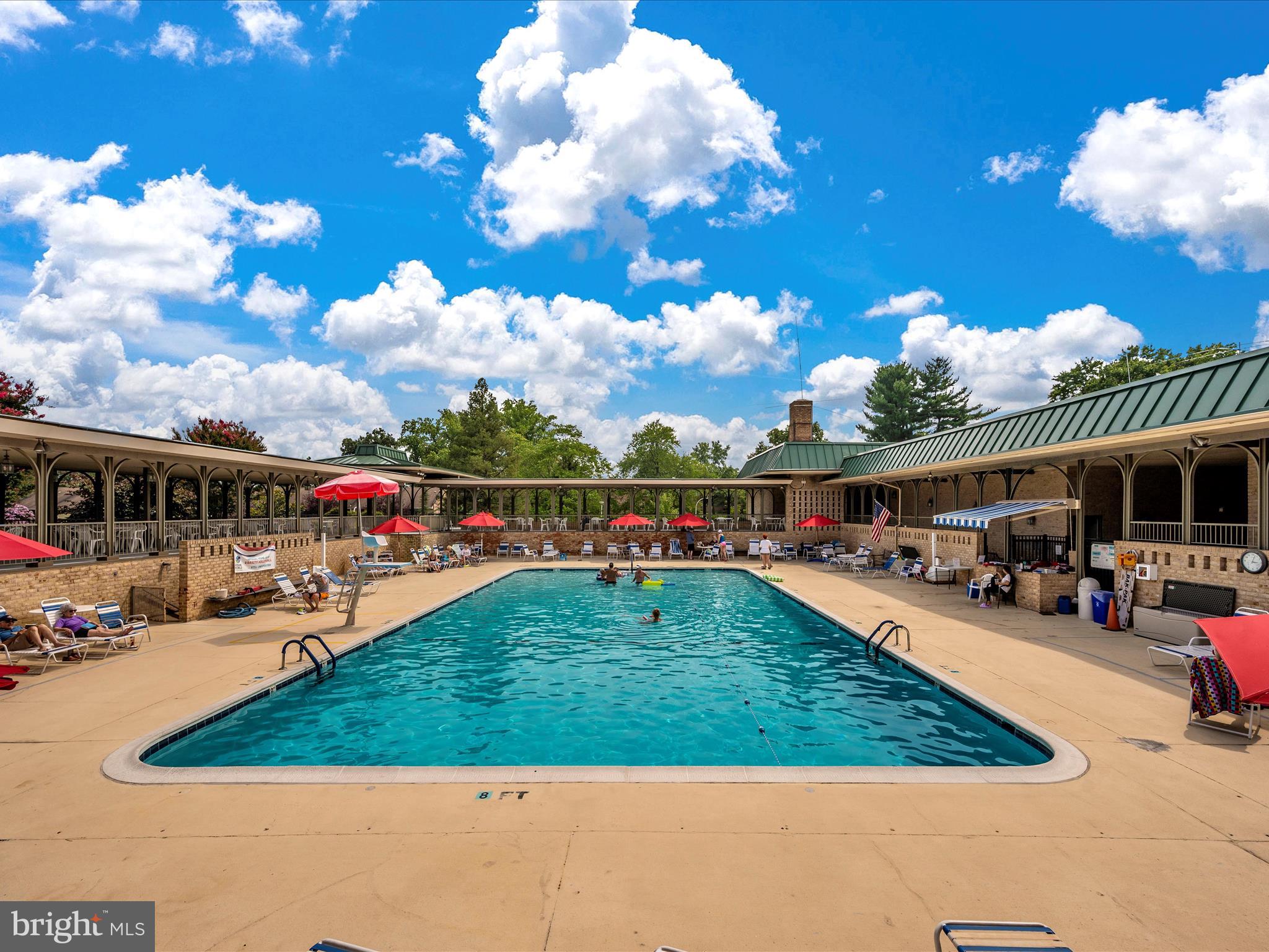15101 Interlachen Drive, Unit 1116 Silver Spring, MD 20906 - Photo 47 of 78 a view of a swimming pool with furniture