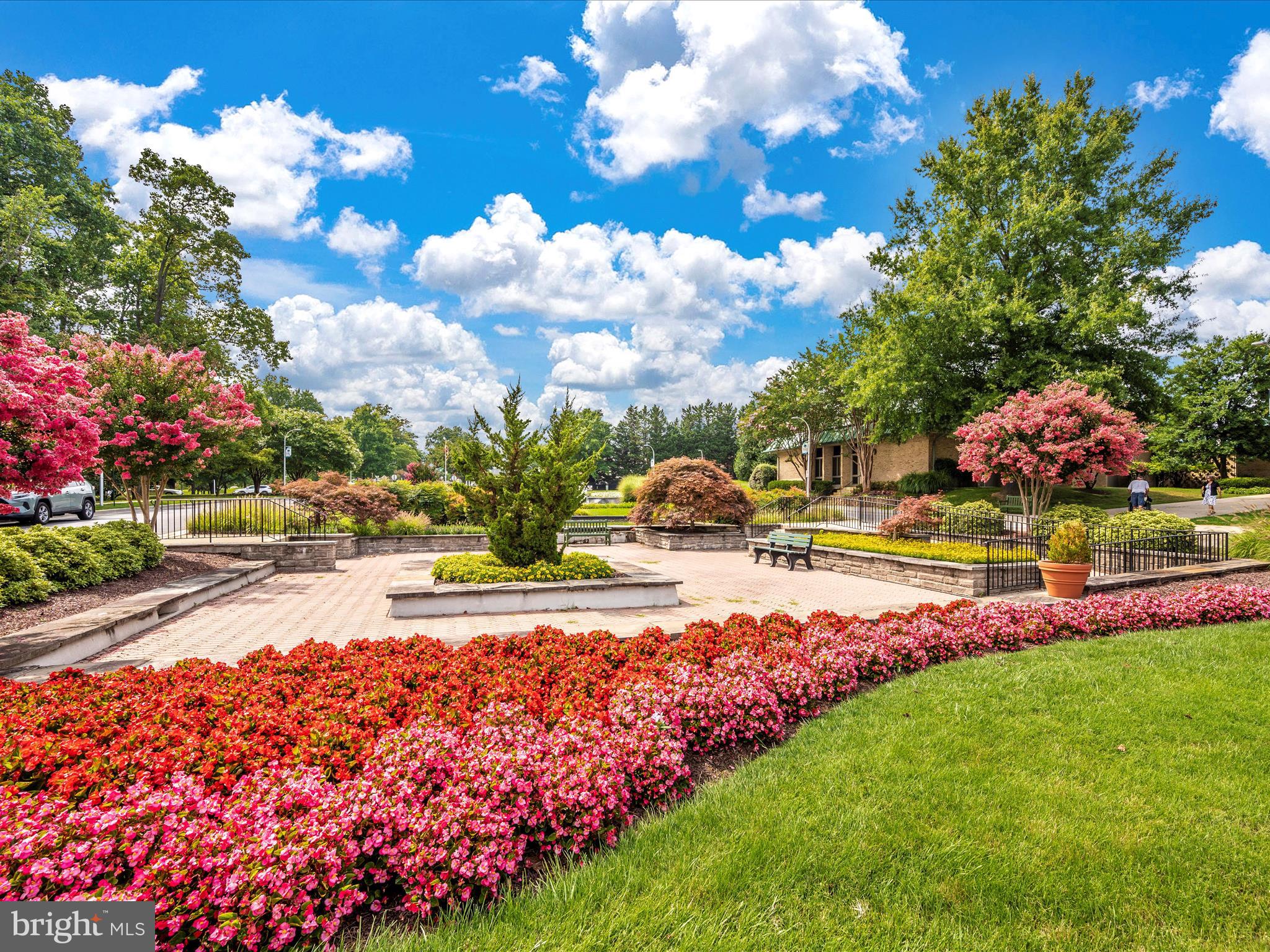 15101 Interlachen Drive, Unit 1116 Silver Spring, MD 20906 - Photo 60 of 78 a view of a swimming pool with an outdoor space and seating area