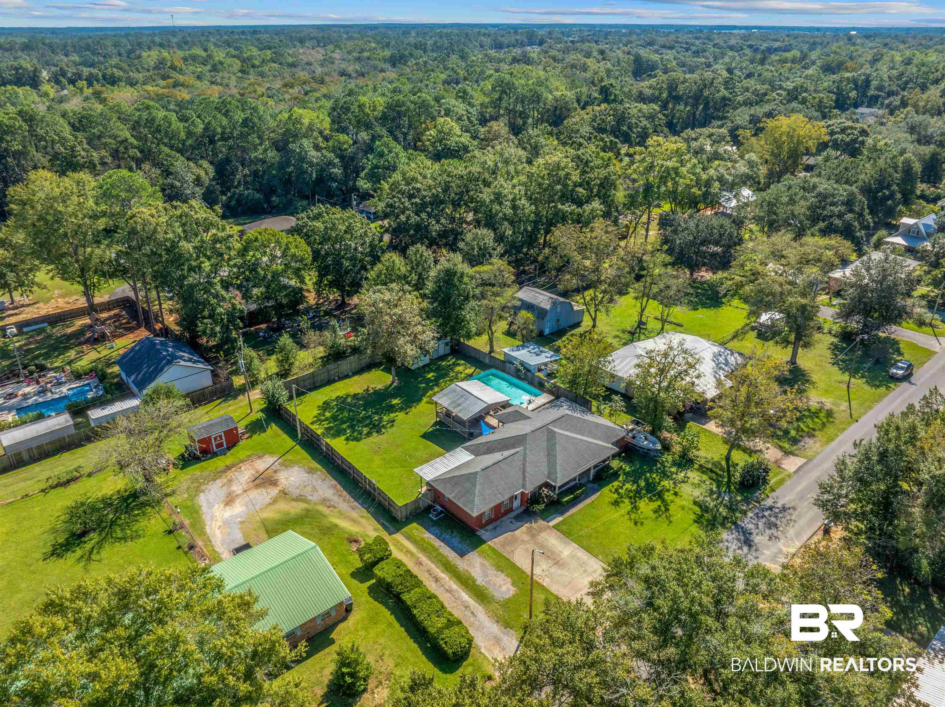 23186 Pecan Street Robertsdale, AL 36567 - Photo 30 of 36 Drone / aerial view of a heavily wooded area