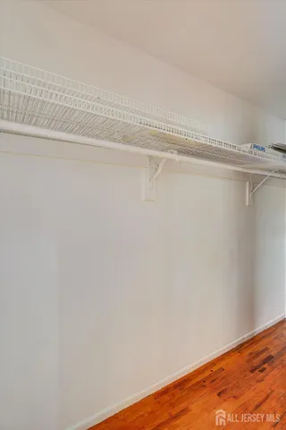 a view of a room with racks on the wall