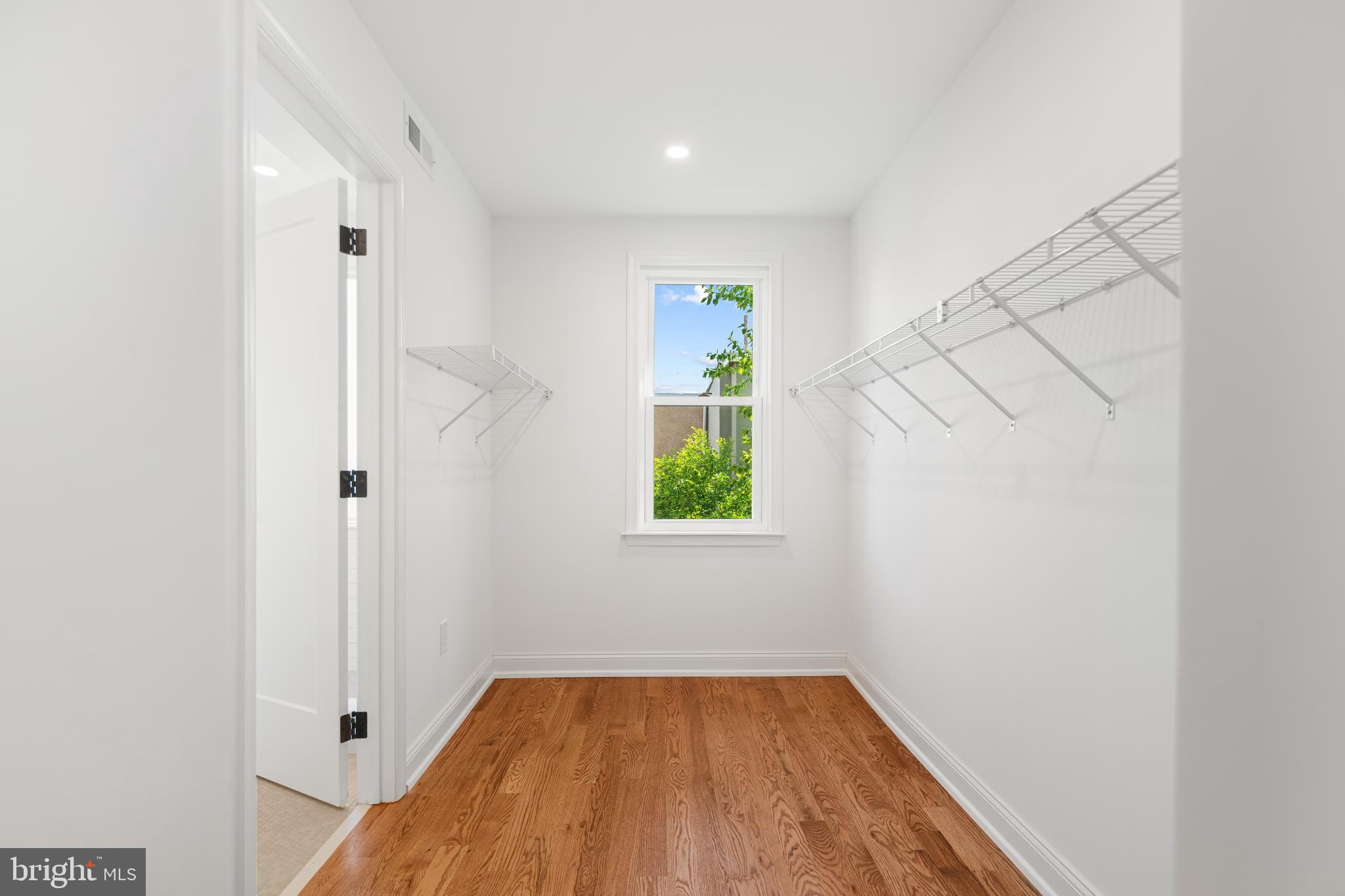 914 Moore Street Philadelphia, PA 19148 - Photo 15 of 26 a view of small space with wooden floor and a window