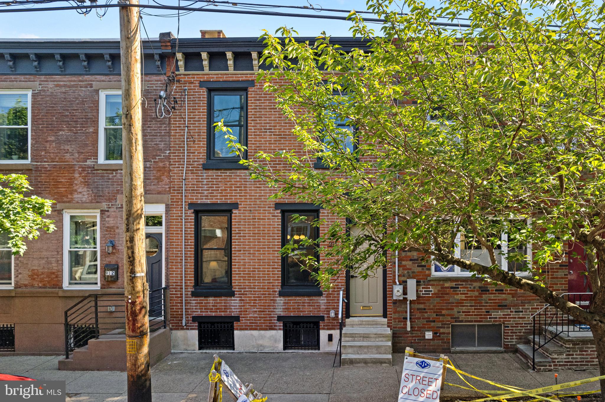 914 Moore Street Philadelphia, PA 19148 - Photo 2 of 26 a front view of a building with balcony