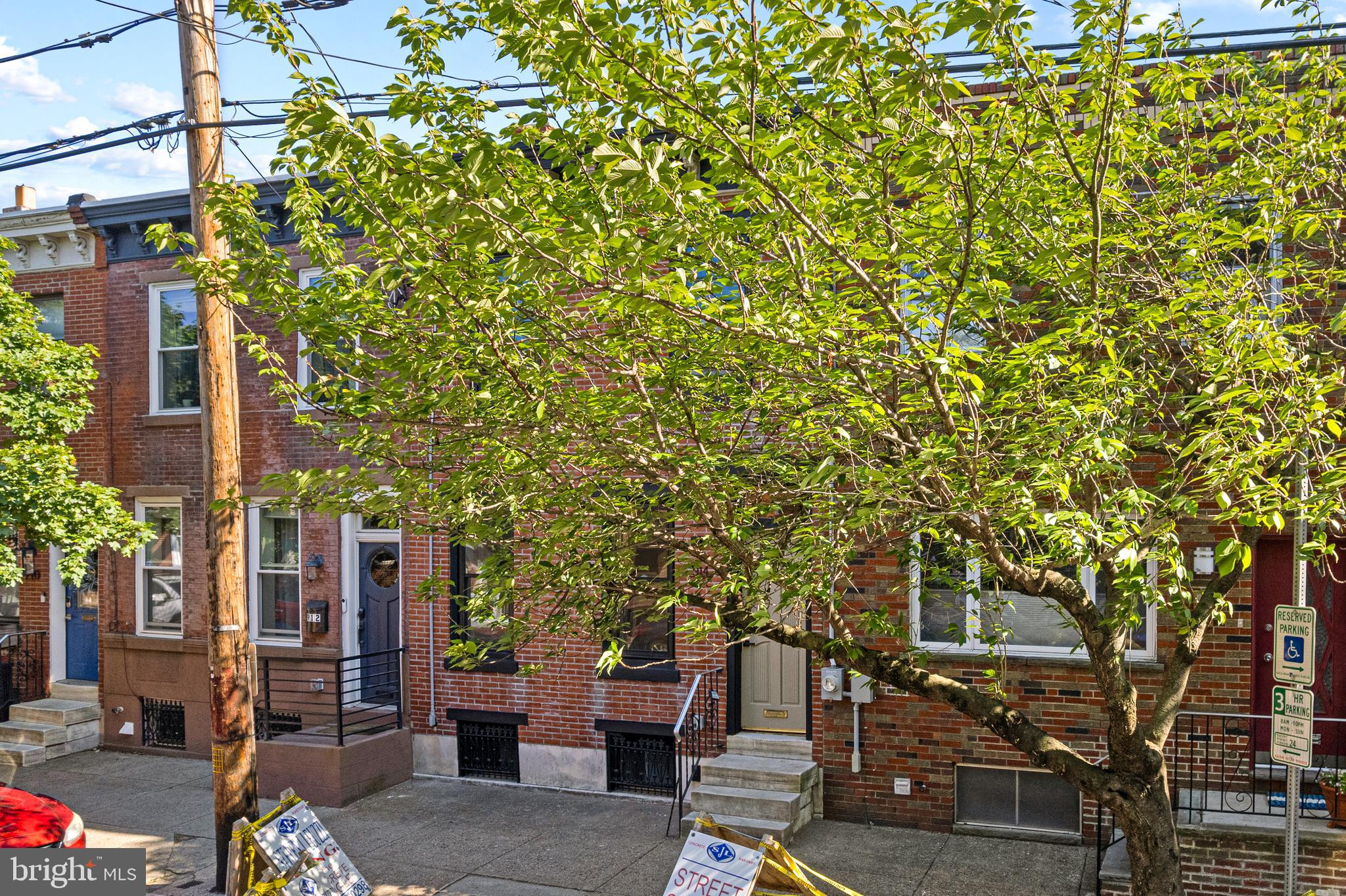 914 Moore Street Philadelphia, PA 19148 - Photo 25 of 26 a view of a patio with table and chairs and potted plants