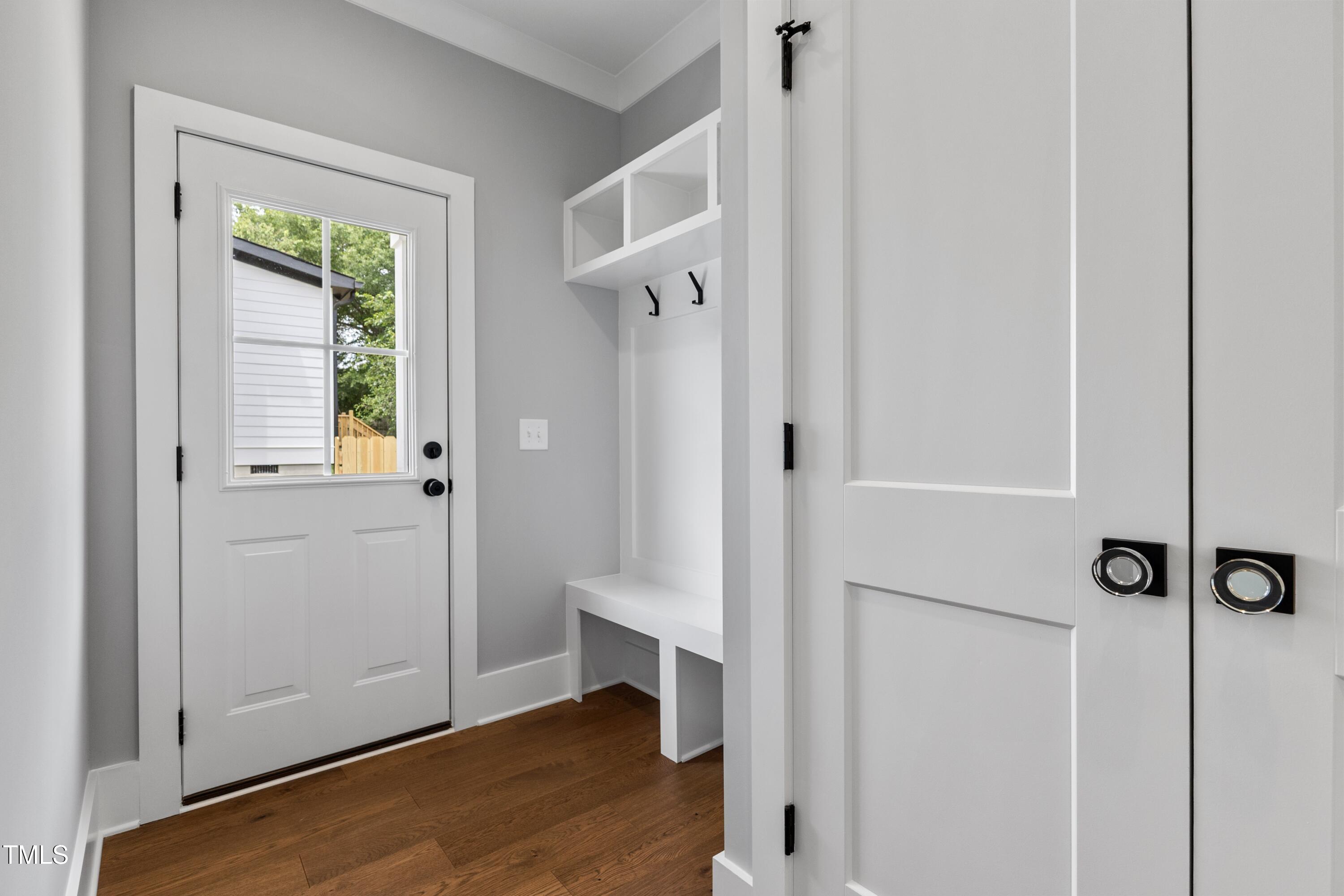 2521 Newbold Street Raleigh, NC 27603 - Photo 18 of 40 a view of a hallway with wooden floor and closet