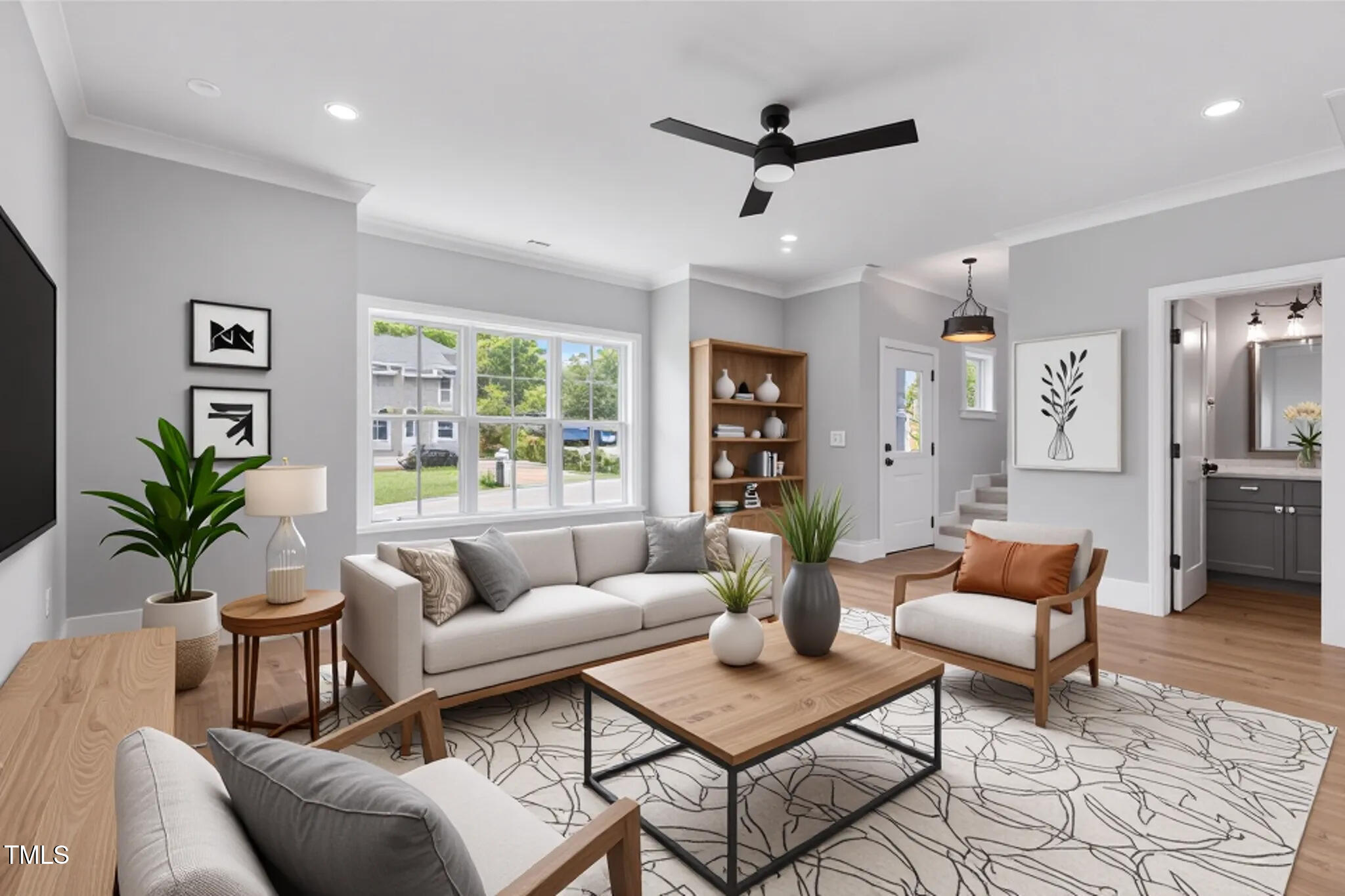 2521 Newbold Street Raleigh, NC 27603 - Photo 9 of 40 a living room with furniture and a large window