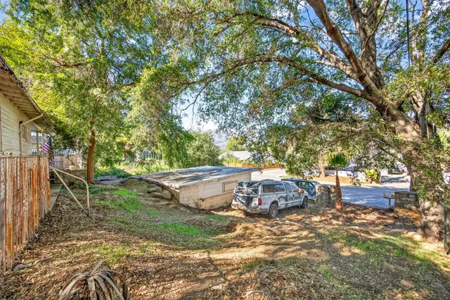 a view of a car parked in front of a house