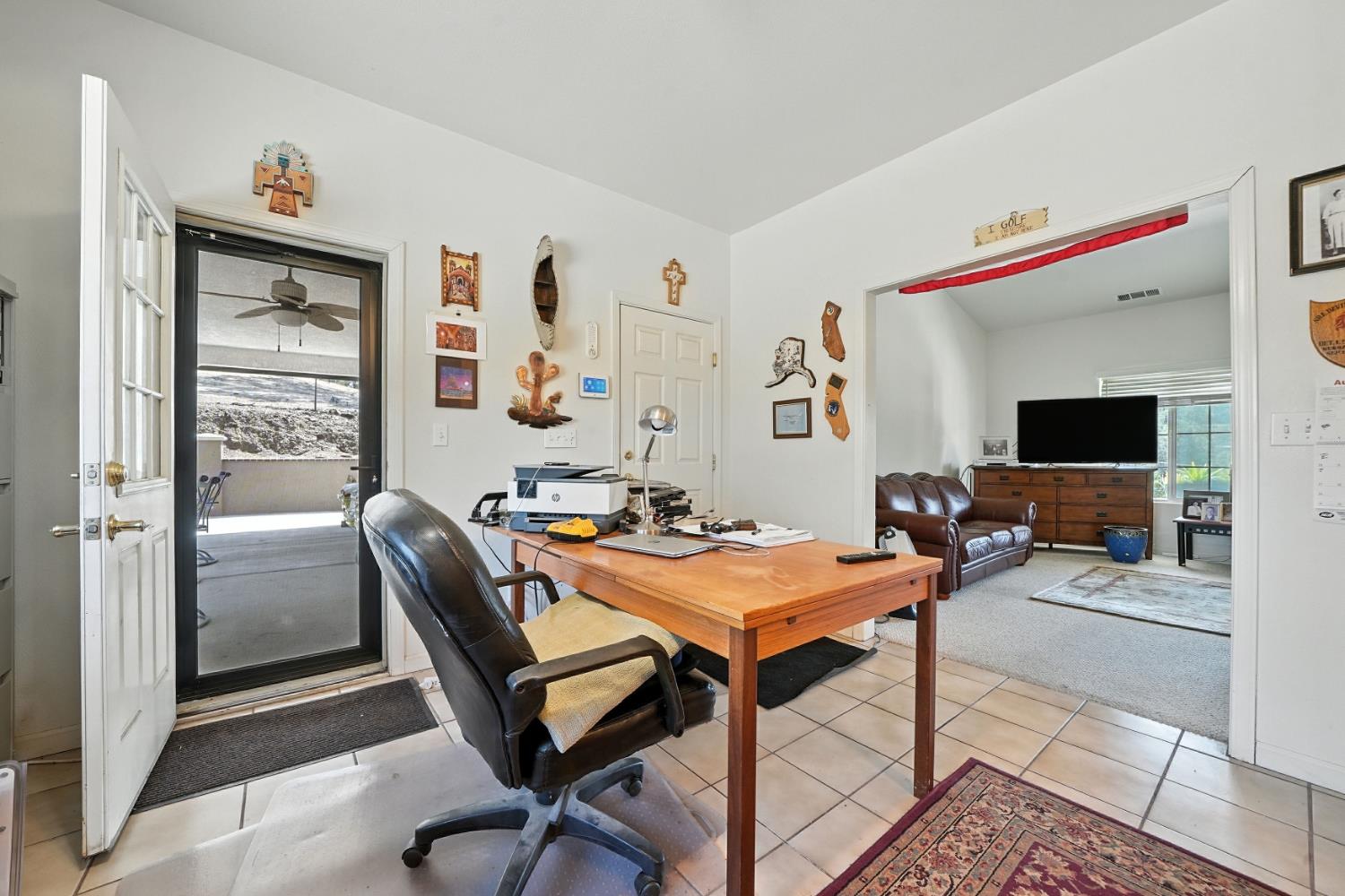 5939 Garner Place Valley Springs, CA 95252 - Photo 17 of 40 a room with furniture and a flat screen tv